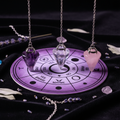 Pendulum divination set with crystal pendulums and dowsing chart
